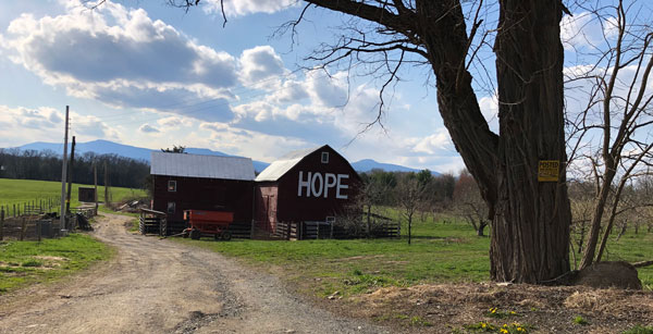 red barn with HOPE written on the side