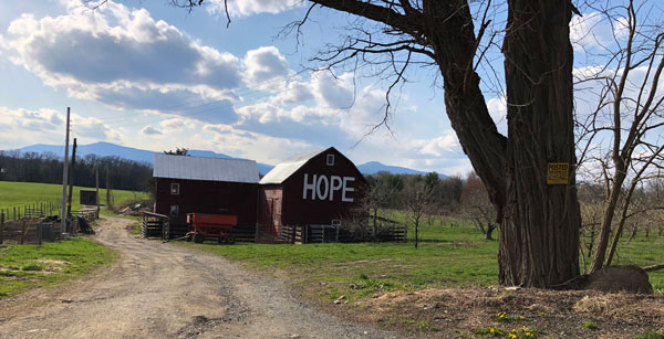 red barn with HOPE written on the side